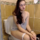 A pretty Eastern-European girl takes a shit while sitting on a toilet and progressively puts more and more effort into pushing the rest out. Audible pooping sounds and plops, although audio is somewhat compressed. 720P HD. About 8 minutes.